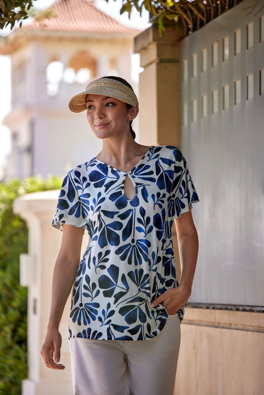MAGLIA FLUIDA CON STAMPA FLOREALE E DETTAGLIO A GOCCIA